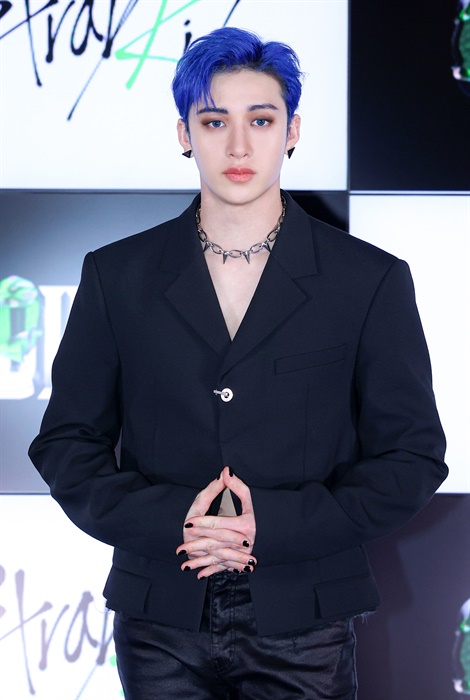 Bang Chan poses in a photo session (Photo Credit / JYP Entertainment)