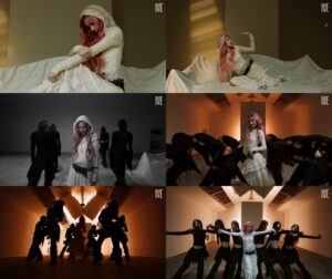 Gaeul in white hooded outfit performing “Odd” with backup dancers in dramatic lighting.