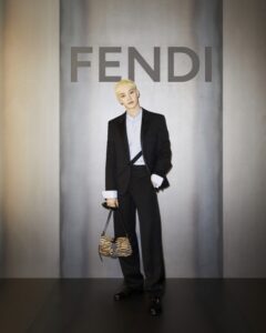 Bang Chan posing in Fendi luxury fashion campaign looks, highlighting Stray Kids’ promotion ambassador roles with global brands.