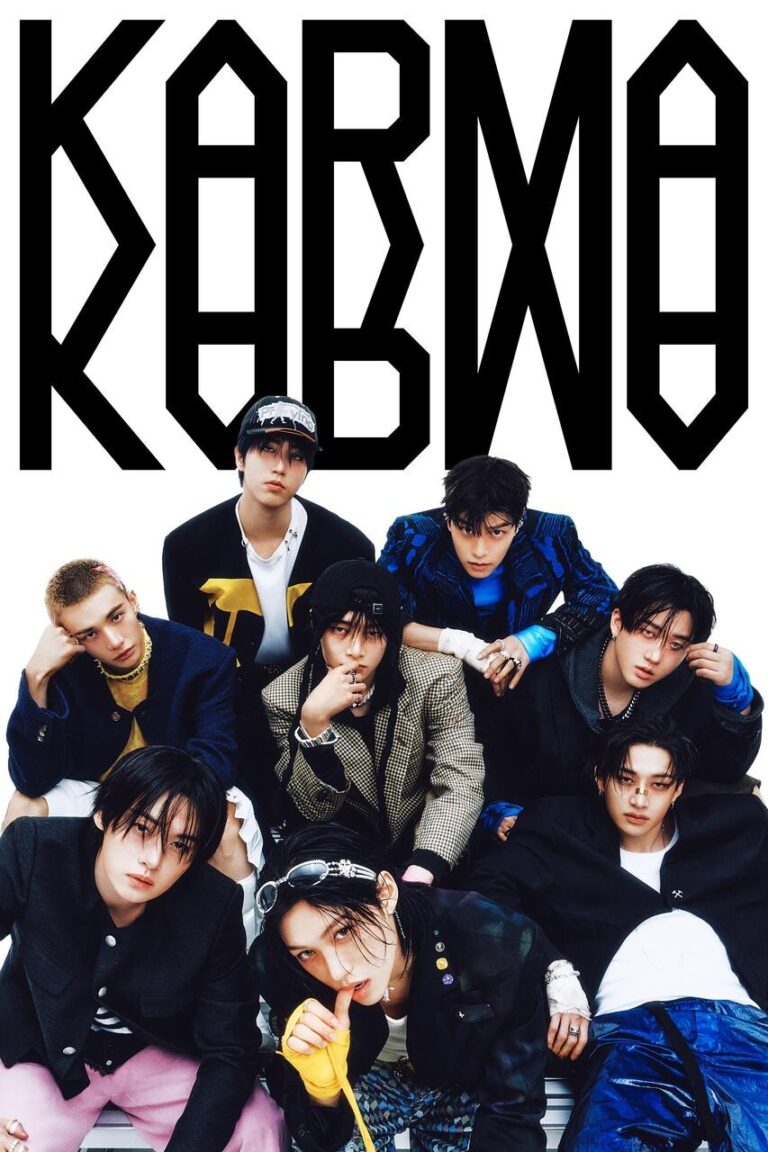 Promotional image featuring eight young men in eclectic, fashion‑forward outfits posing against a white background. Above them, the word “KARMA” is displayed in bold, geometric black font, highlighting the album branding.