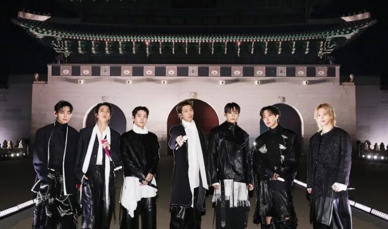BTS members pose at Gwanghwamun during their comeback concert on March 21.
