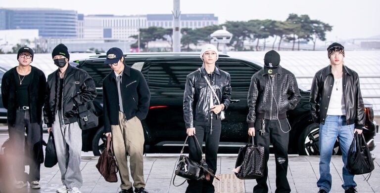 Stray Kids members pose before departing Incheon International Airport (Photo / iMBC screenshot)