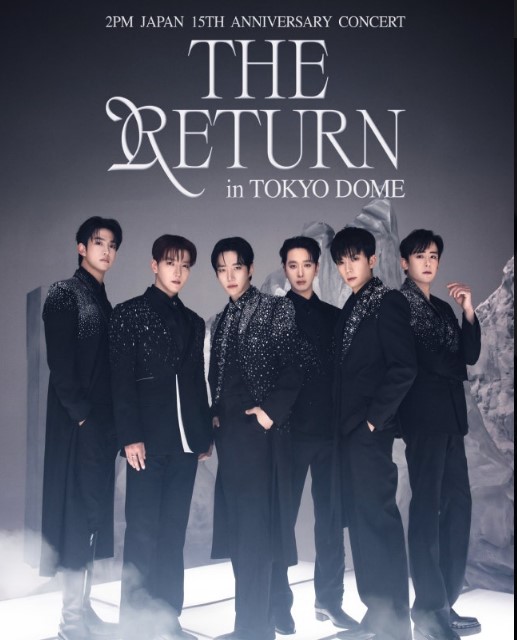 2PM members pose in black outfits for their Japan 15th anniversary concert poster.