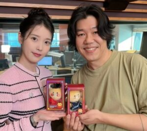 IU poses after appearing on Lee Sang Soon's MBC radio program