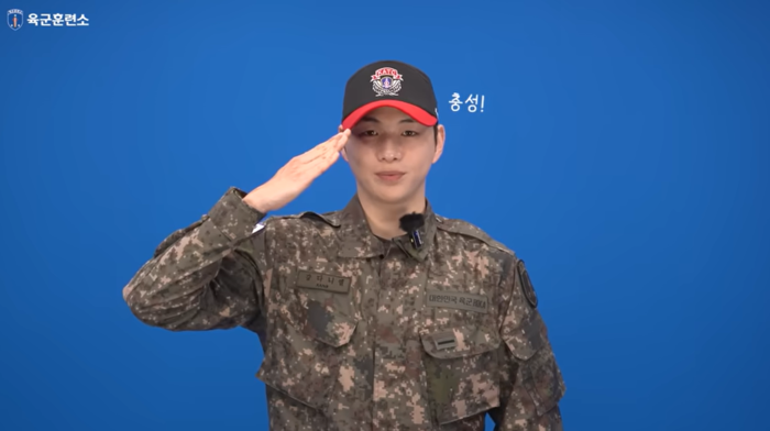 Kang Daniel salutes to fans in a video from the Korea Army Training Center.