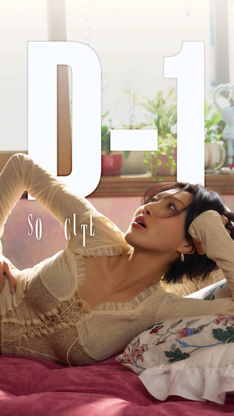 HWASA ‘So Cute’ D-1 teaser poster with the singer in a lace corset outfit.