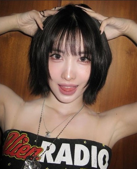 Momo of TWICE poses for a photo shooting.