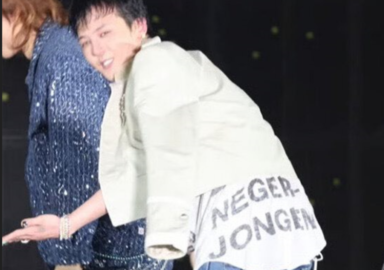 G-Dragon performs at the “K-SPARK in Macau” event on May 2, wearing a controversial T-shirt featuring racist and obscene slogans.