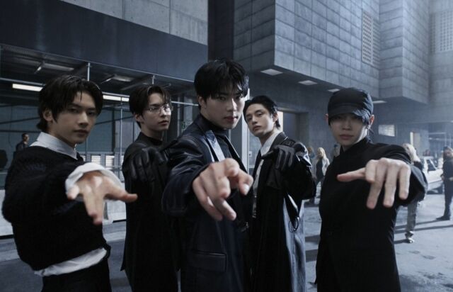 ZEROBASEONE exudes charisma in sleek black outfits, commanding attention with a powerful pose ahead of their “TOP 5” comeback stage.