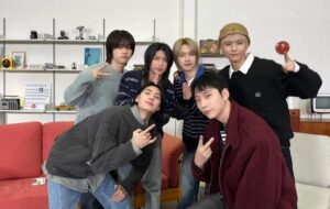 Xdinary Heroes pose for a camera.