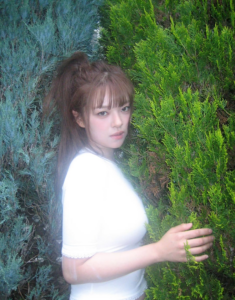 Jeongyeon captivates fans with her chic styling and refreshed look in new SNS photos, showing confidence after overcoming steroid-related weight gain.