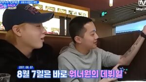 Ha Sung Woon and Lai Kuanlin sit together at a restaurant table.