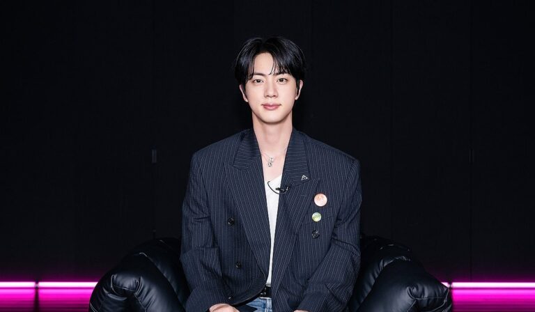 BTS's Jin poses for a photo.