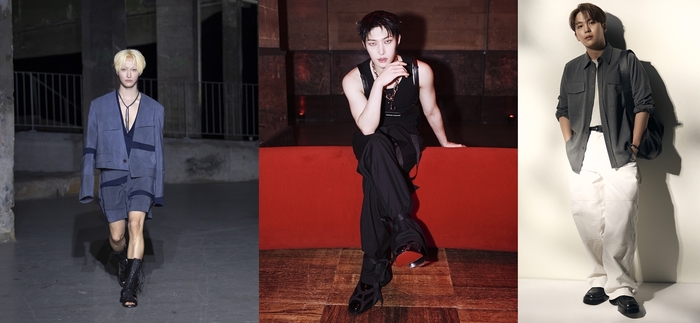 Three ATEEZ members—Seonghwa, Mingi, and Jongho—pose in distinct fashion looks. Seonghwa walks a runway in a blue-gray outfit, Mingi sits in a sleek black ensemble, and Jongho stands casually in a gray shirt and white pants.
