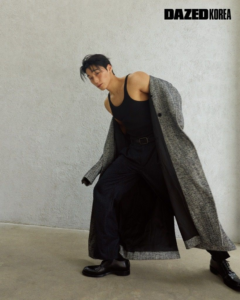 ATEEZ San in a long gray coat for Dazed Korea.
